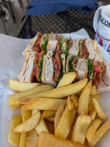 Club sandwich with thick-cut fries