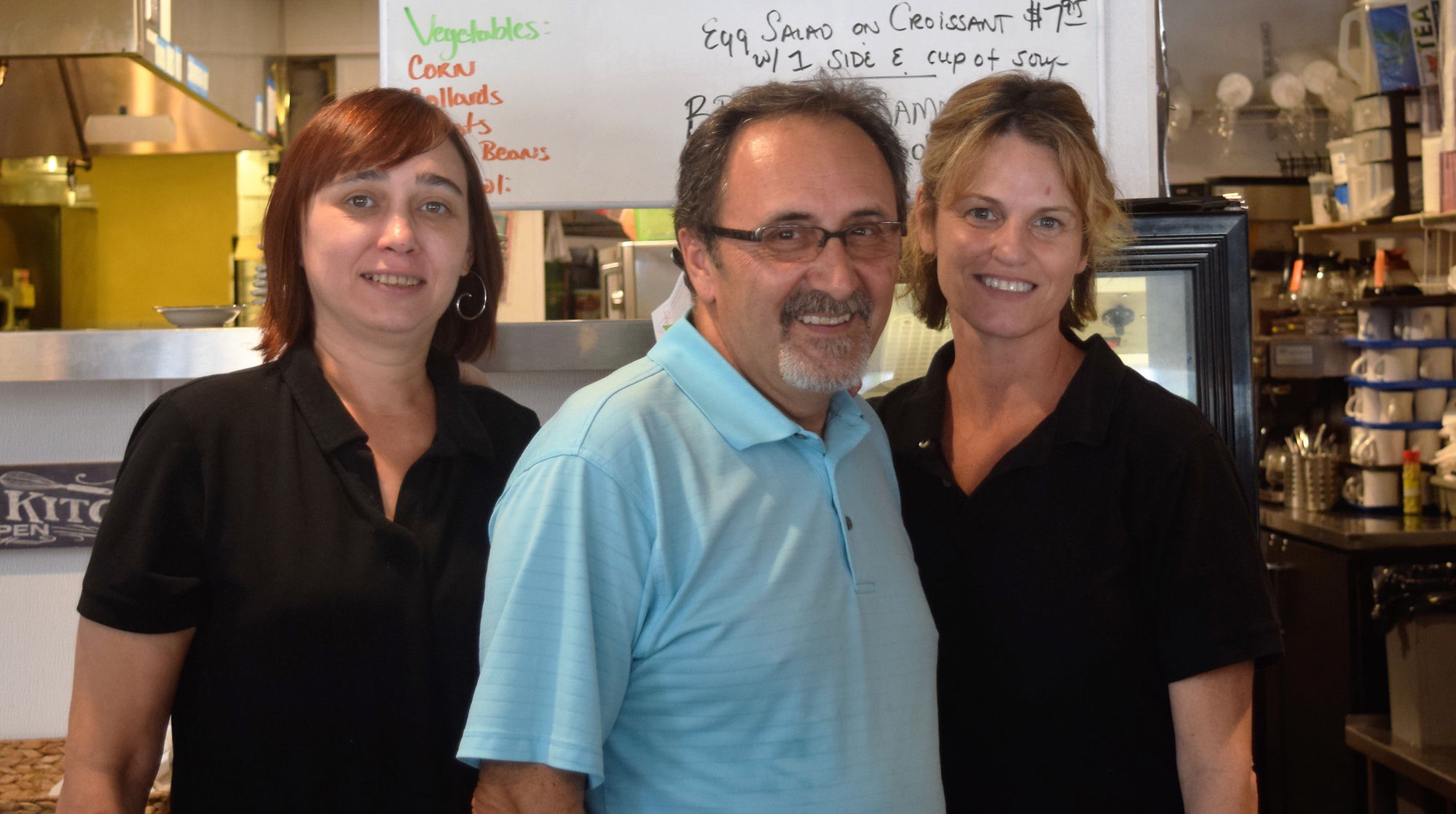 The Christo's Cafe team behind the counter
