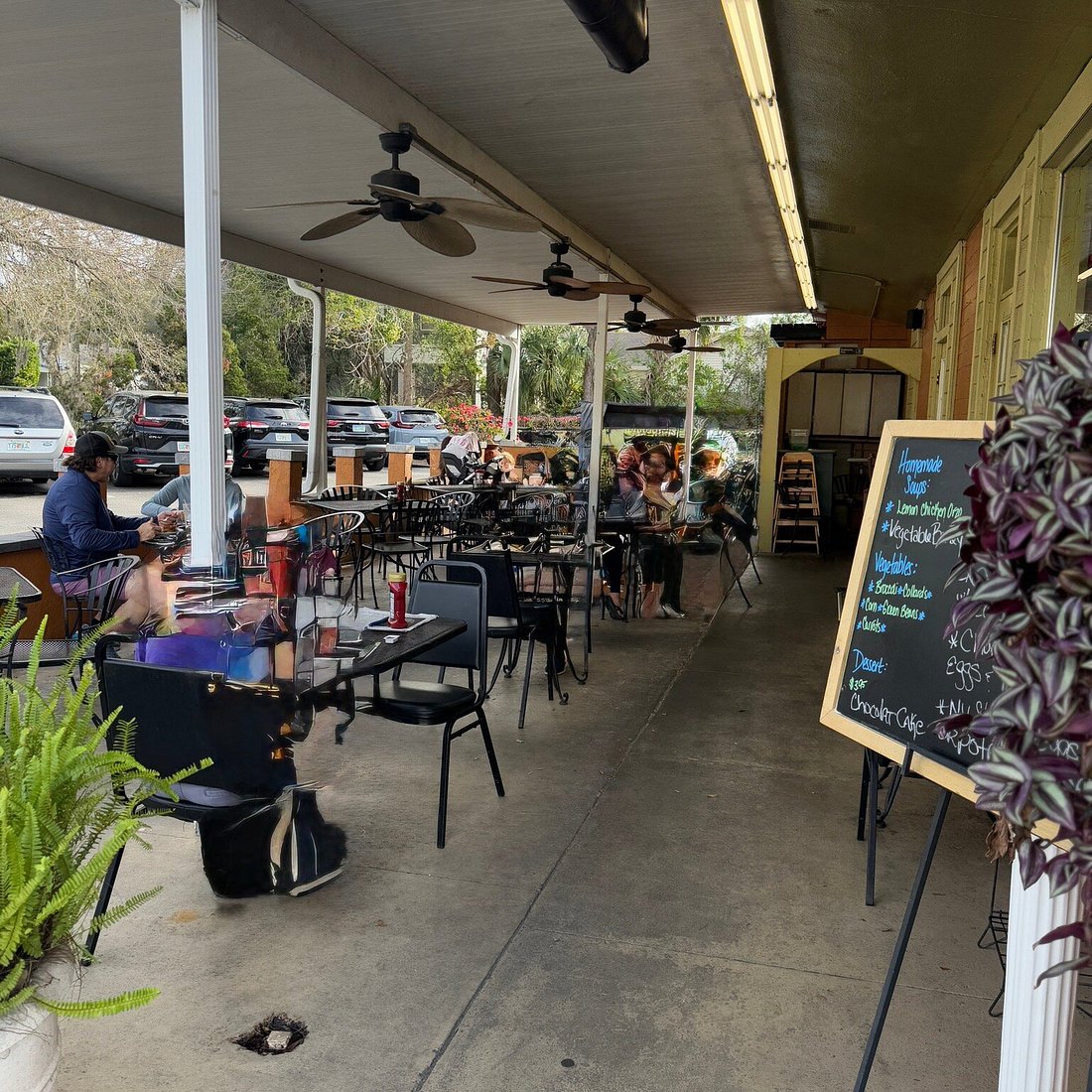 The covered patio with chalkboard specials