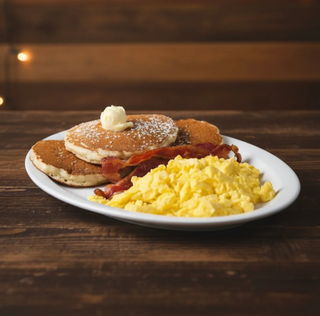 Country boy breakfast — pancakes, eggs, bacon